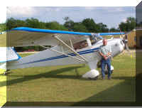 Tony Standing By Plane